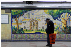 Man in front of a mural, Independencia station, Subte (Buenos Aires subway).