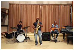 Musicians performing at Abdala Studios, including Oliver Vald&eacute;s on drums and Carlos Miyares on saxophone.