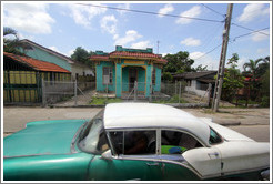 Aqua house and green and white car, Calle Perla, La V&iacute;bora neighborhood.