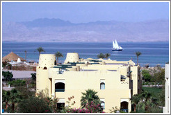 Marriott Hotel, with sailboat and the mountains of Saudi Arabia in the background.