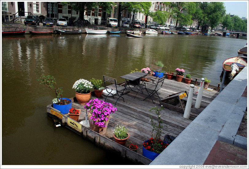 Dock with flowers, Singel canal, Centrum district.