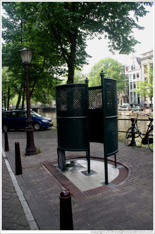 Urinoir (partially exposed outdoor standing toilet).  Centrum district.