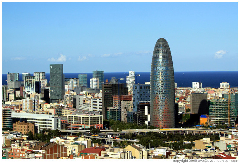 Barcelona, including the bullet-shaped Agbar tower, viewed from the Sagrada Familia.