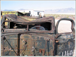 Jesse at helm of old car near Spiral Jetty.