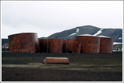 Large tanks used for diesel fuel and whale oil, Whaler's Bay.