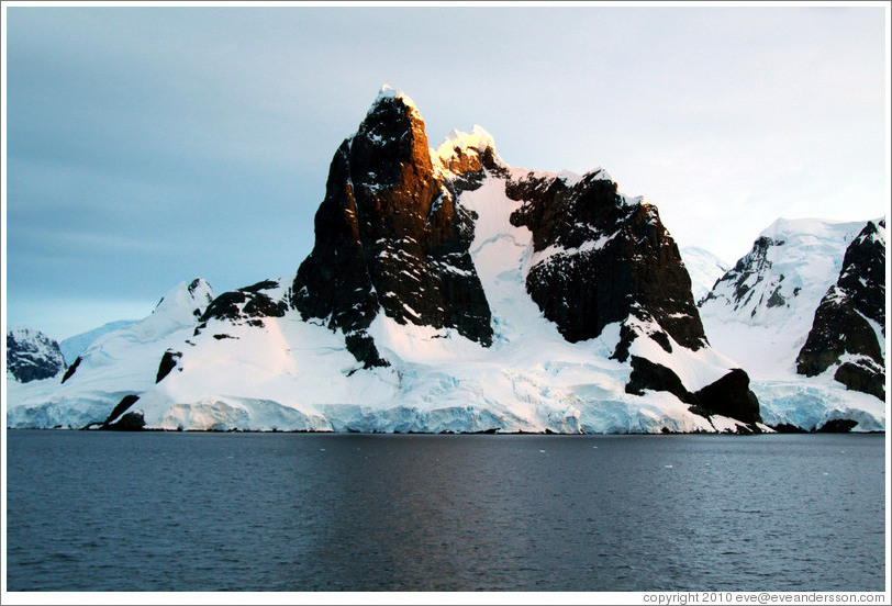 Black, snow-covered mountains, Gerlache Strait