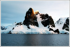 Black, snow-covered mountains, Gerlache Strait