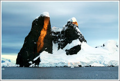 Black, snow-covered mountains, Gerlache Strait