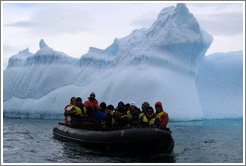 Zodiac among icebergs.