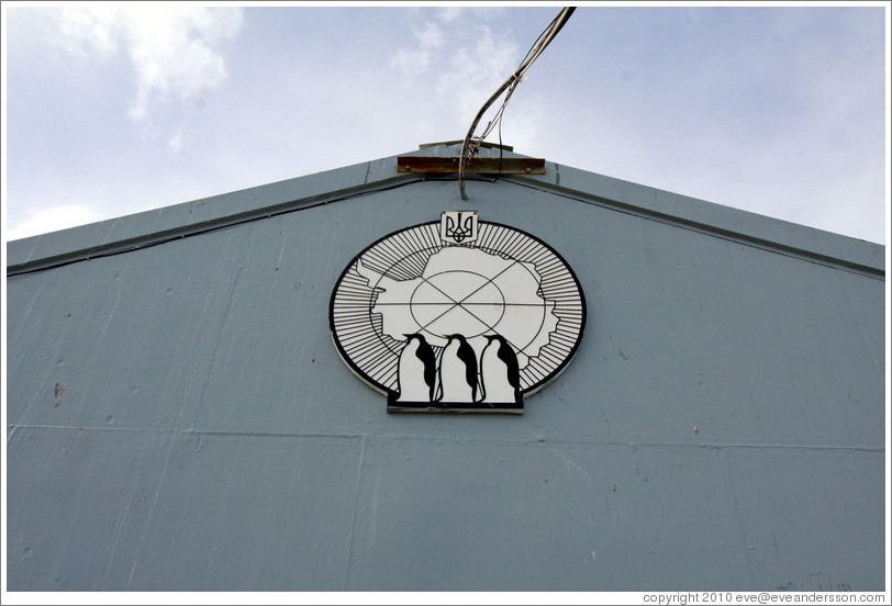 Sign with Antarctica and three penguins, Vernadsky Station.