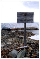 "British Crown Land" sign by Wordie House, a British scientific research station dating from 1947.