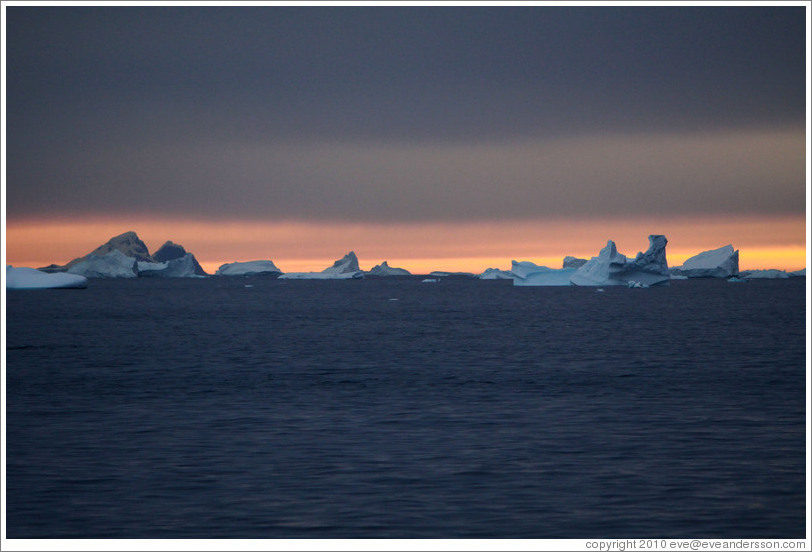 Sunset and icebergs.