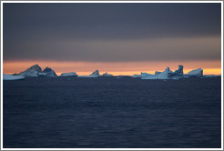 Sunset and icebergs.