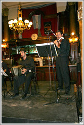 Musicians at a milonga at the Confiter&iacute;a Ideal.