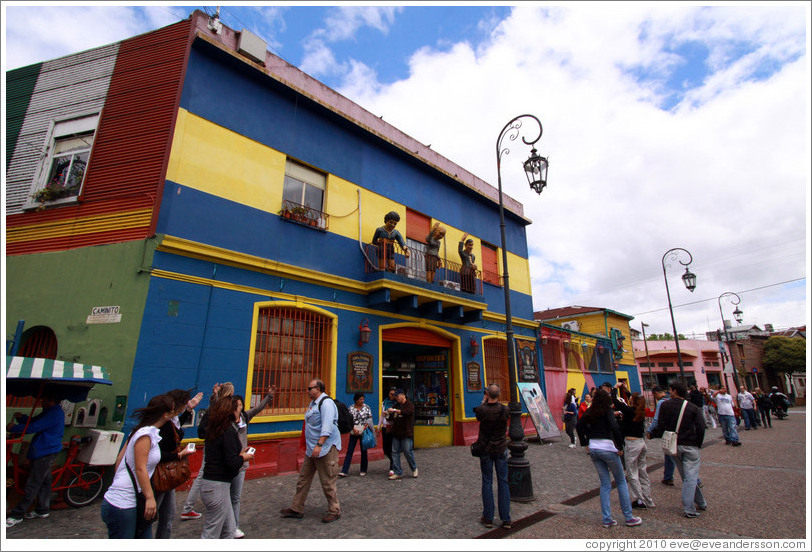 Centro de Exposiciones Caminito, with figures of Diego Maradona, Evita and Carlos Gardel on its facade. La Boca.