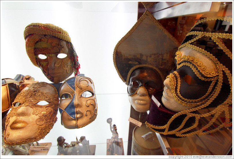 Masks in a display case. Ateneo, a bookstore housed in a former theatre.  Avenida Santa Fe branch. Recoleta.