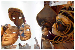 Masks in a display case. Ateneo, a bookstore housed in a former theatre.  Avenida Santa Fe branch. Recoleta.