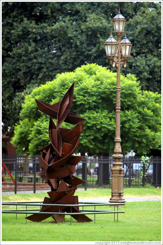 Sculpture and lamp post, Plaza Urquiza, Recoleta district.