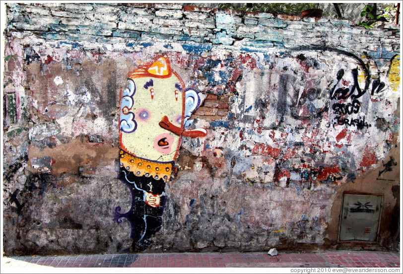 Graffiti (potato? with long nose), Calle Defensa and Avenida Independencia, San Telmo district.