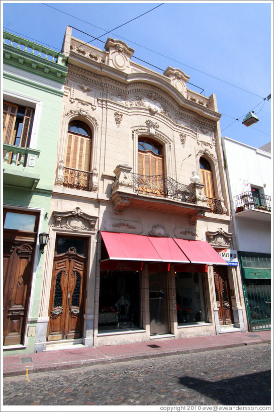 Calle Defensa near Avenida Carlos Calvo, San Telmo district.