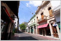 Calle Defensa near Avenida Carlos Calvo, San Telmo district.