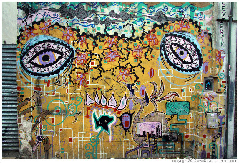 Graffiti depicting eyes, among other things. Avenida Independencia near Calle Tacuar?San Telmo.