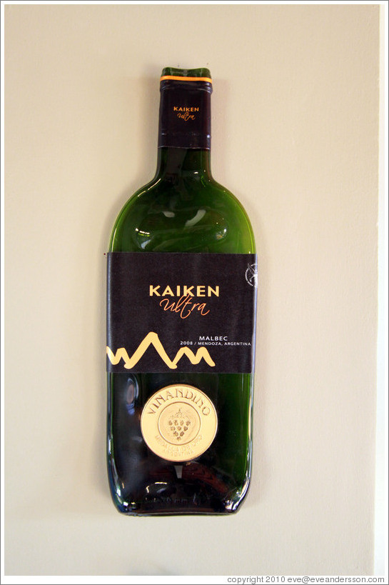Flattened wine bottle, Kaiken Winery, Luj?de Cujo.