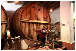 Guide and large barrel. Museum of Bodega La Banda.