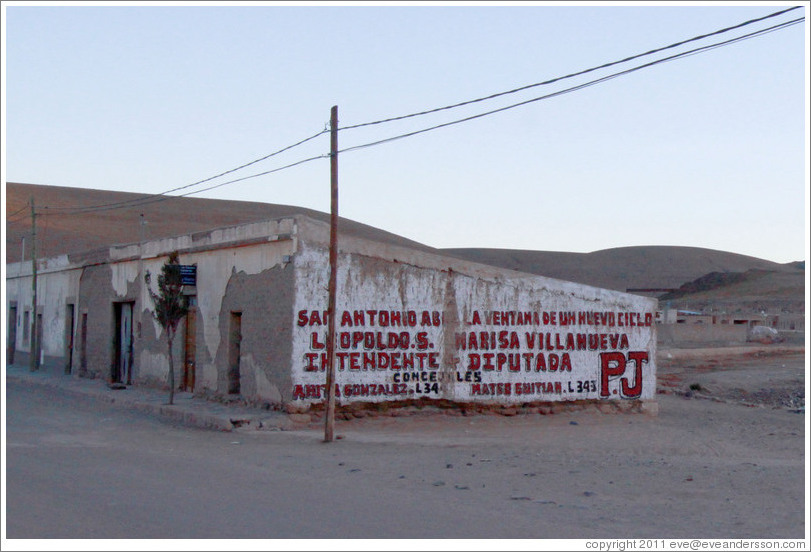 Building with a political advert painted on the side.