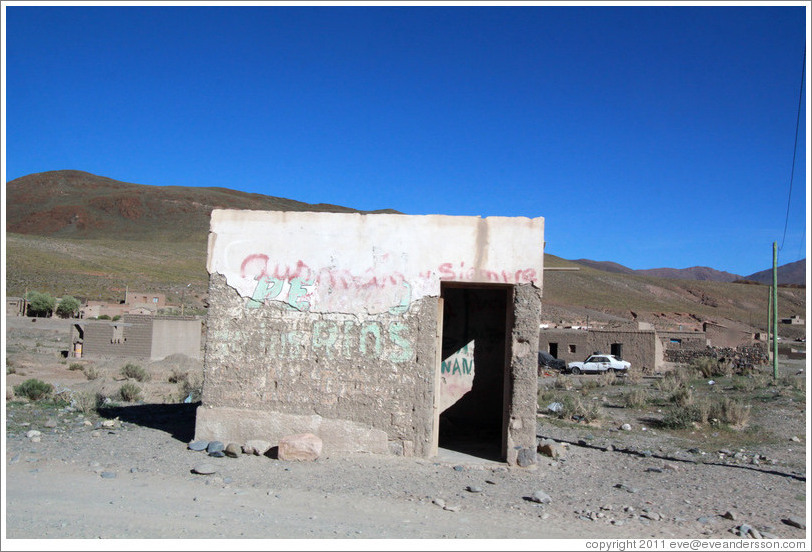 Building with faded lettering.