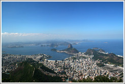 View of P&atilde;o de A&ccedil;&uacute;car (Sugarloaf Mountain) and surrounding city from the top of Corcovado Mountain.