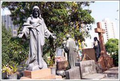 Tombs with Jesus sculptures.  Cemit?o S?Paulo.