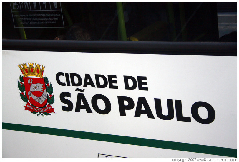 City of S&atilde;o Paulo, written on the side of a bus.