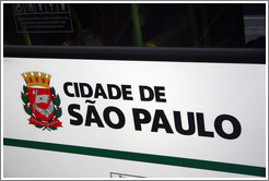 City of S&atilde;o Paulo, written on the side of a bus.