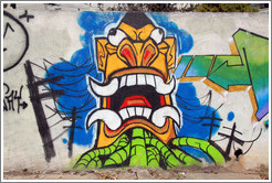 Graffiti: creature with pointed teeth and green tubes.  Av. H?o Pellegrino at Rua Marcos Lopes.