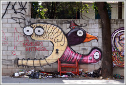 Graffiti: three creatures (or one with three heads).  Rua Olimp?as.