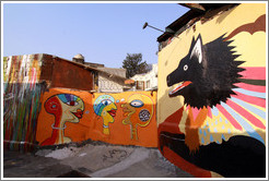 Graffiti: black dog and three heads.  Villa Magdalenda neighborhood.  Alley between Rua Padre Jo?Gon?ves and Rua Belmiro Braga.