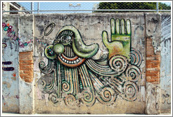 Graffiti: green cyclops with hand.  Villa Magdalenda neighborhood.  Rua Ant? Bicudo near Rua Benjamin Egas.