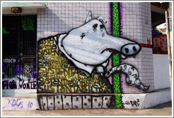Graffiti: sad pig wearing a tie with numbers on it.  Villa Magdalenda neighborhood.  Rua Belmiro Braga and Rua Cardeal Arcoverde.