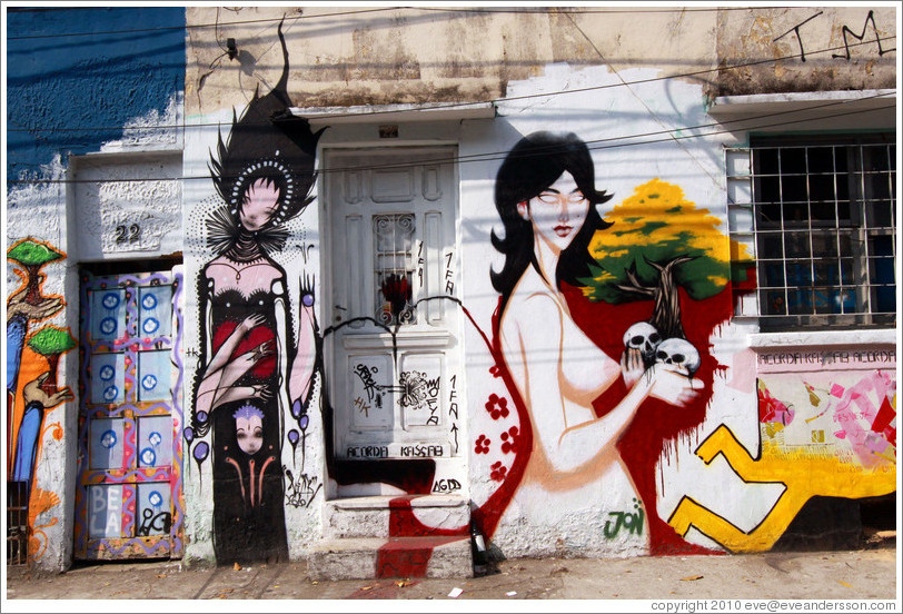 Graffiti: woman with four arms and naked woman with two skulls and a tree.  Villa Magdalenda neighborhood.  Rua Belmiro Braga and Rua Cardeal Arcoverde.