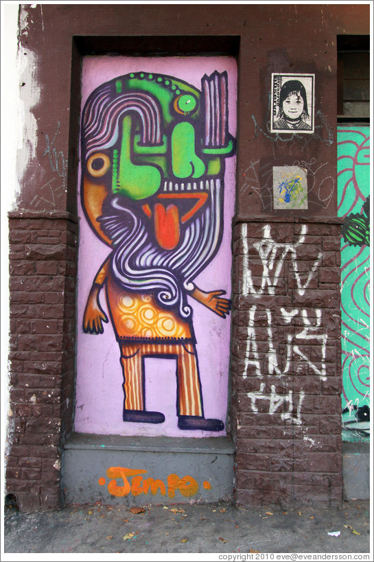 Graffiti: man with a green, rearranged face.  Villa Magdalenda neighborhood.  Rua Cardeal Arcoverde.