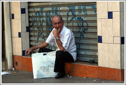 Man smoking in Liberdade, a Japanese district in S&atilde;o Paulo.