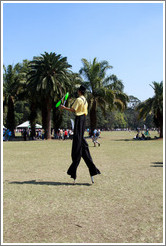 Juggling man walking on stilts.  Parque do Ibirapuera.