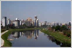 S&atilde;o Paulo skyscrapers, reflected in river.