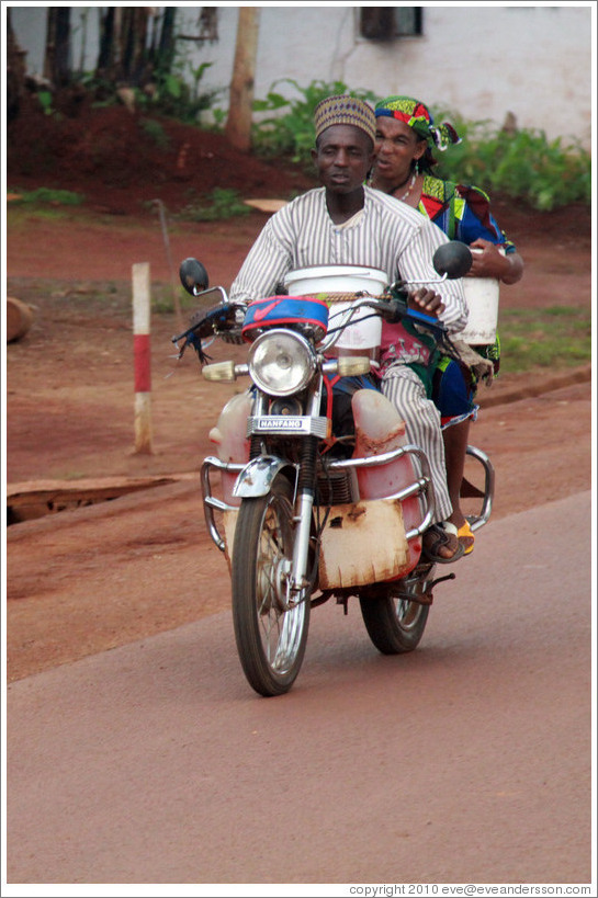 Man and woman on a motorcycle.