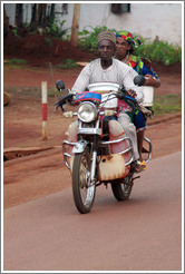 Man and woman on a motorcycle.