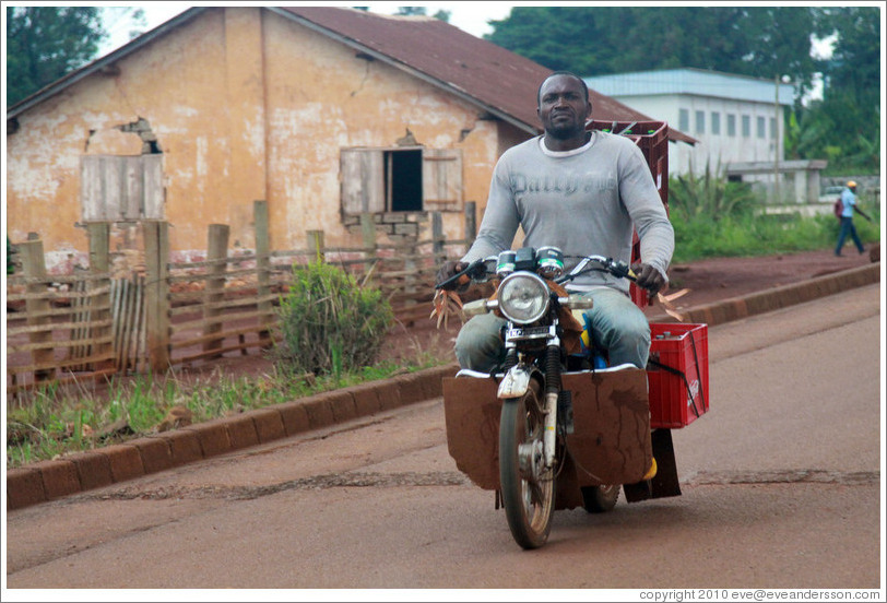 Man on a motorcycle.