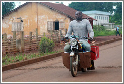 Man on a motorcycle.