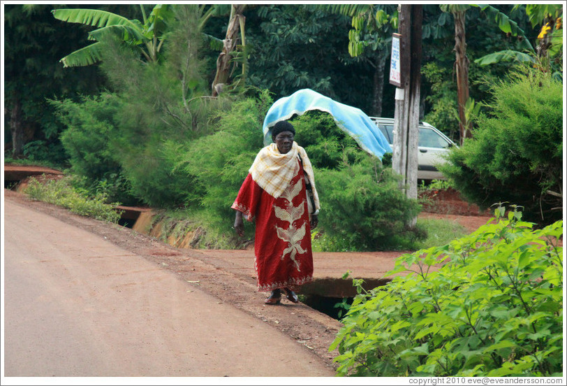 Woman walking down the road.