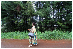 Woman walking along the side of Route N5.